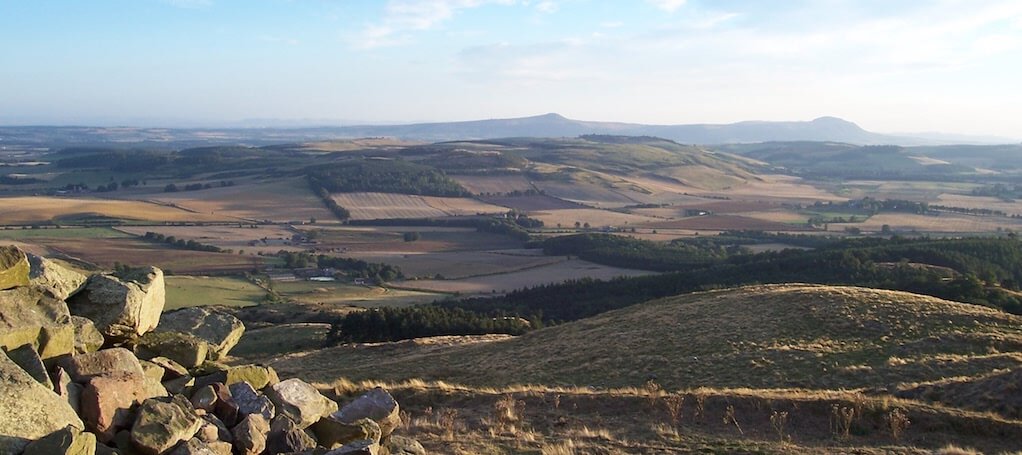 Looking across the farmland of North East Fife to the distant Lomond Hills. Credit: Creative Commons - How Routes Manager Helps Him Building a Hiker Community in Scotland